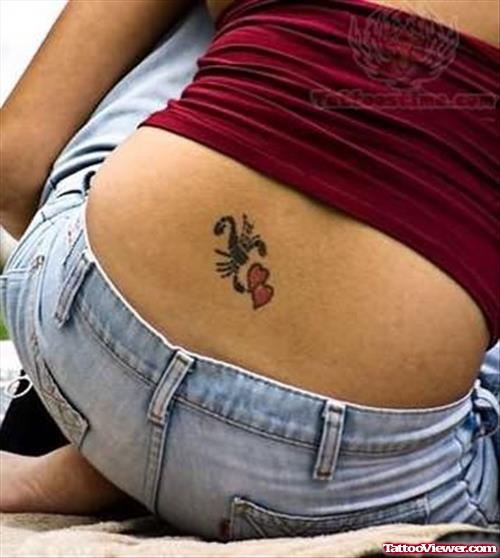 Scorpion And Heart Tattoo On Lower Waist