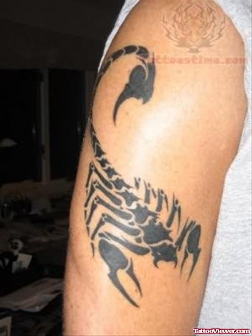 Tribal Scorpion Tattoo On Bicep