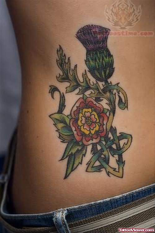 Scottish Flower Tattoo On Rib