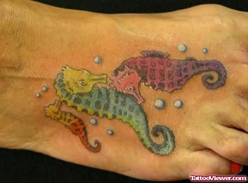 Sea Horse Fight Tattoo On Foot