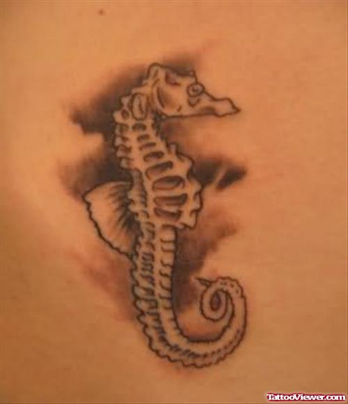 Brown Ink Sea Horse Tattoo