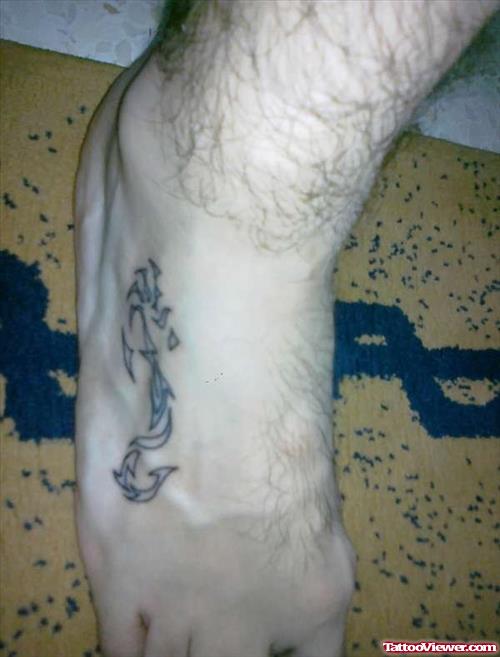 Tribal Seahorse Tattoo On Foot