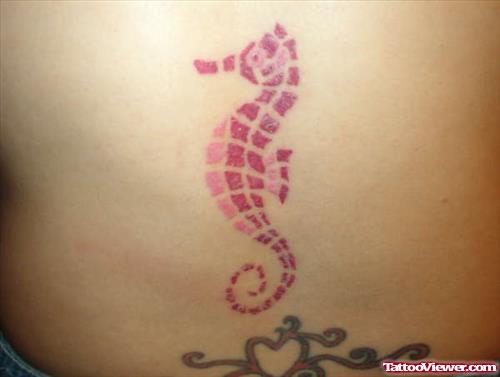 Red Ink Seahorse Tattoo