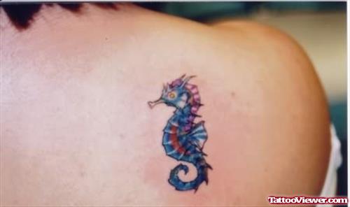 Tiny Seahorse Tattoo On Back