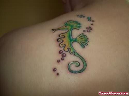 Small Seahorse Tattoo On Shoulder