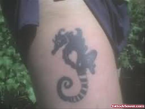 Black Ink Seahorse Tattoo