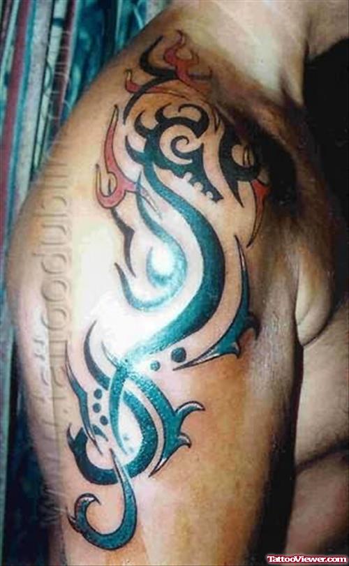 Tribal Seahorse Tattoo On Shoulder
