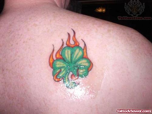 Flaming Shamrock Tattoo On Back Shoulder