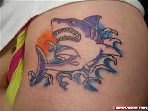 Purple Ink Shark Tattoo On Muscles
