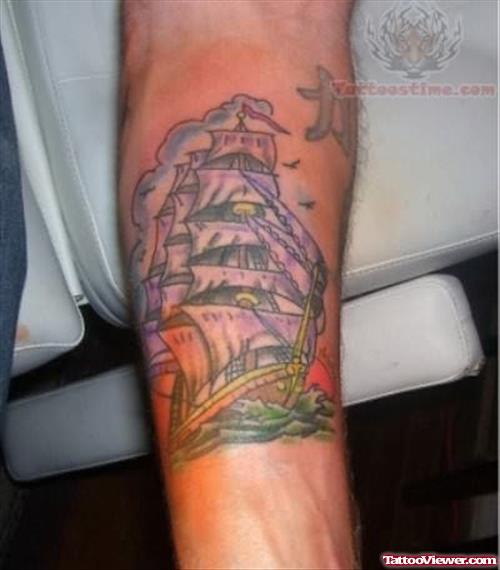 Small Ship Tattoo On Arm