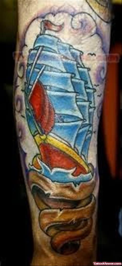 Blue Ship Tattoo On Arm