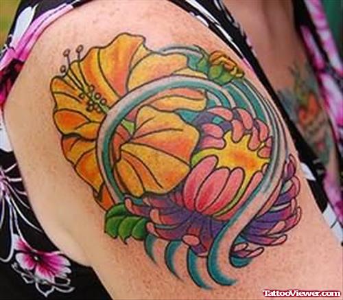 Hibiscus Flowers Coloured Tattoo On Shoulder