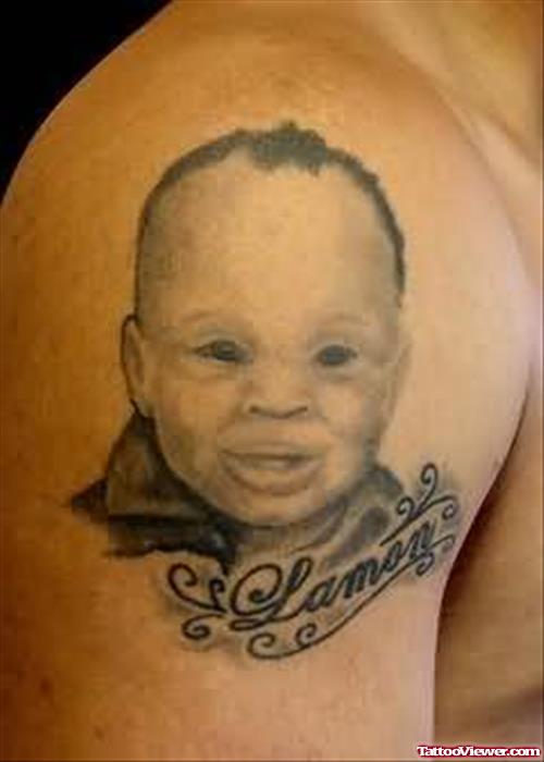 Little Baby Tattoo On Shoulder