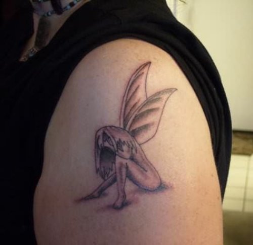 Sad Angel Tattoo On Shoulder