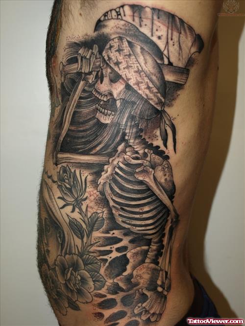 Black Ink Skeleton Tattoo