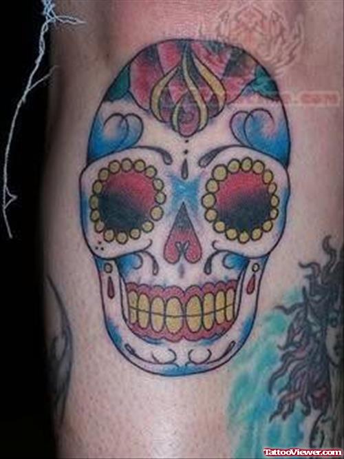 Happy Skull Tattoo On Knee