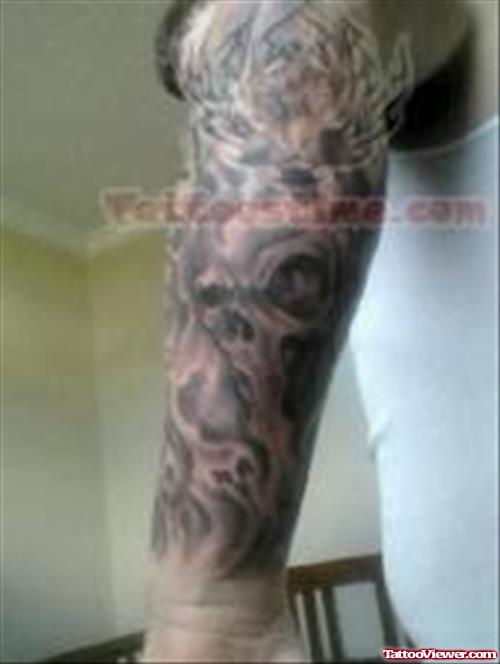Flaming Skulls Tattoos On Arm