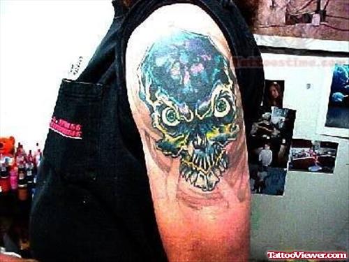 Bluish Coloured Skull Tattoo