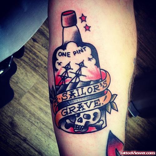   bottle of rum with skull tattoo