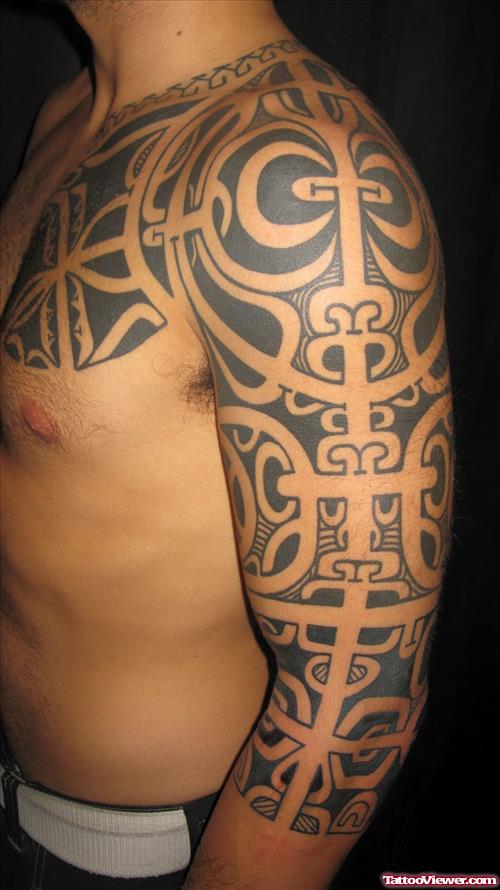 Samoan Chest And Left Sleeve Tattoo