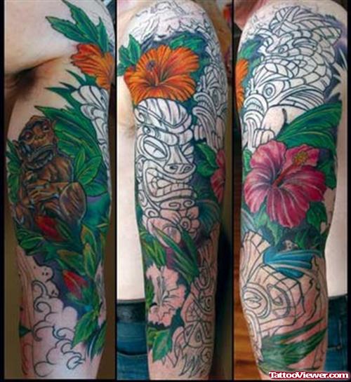 Lily Flowers And Tiki Sleeve Tattoo