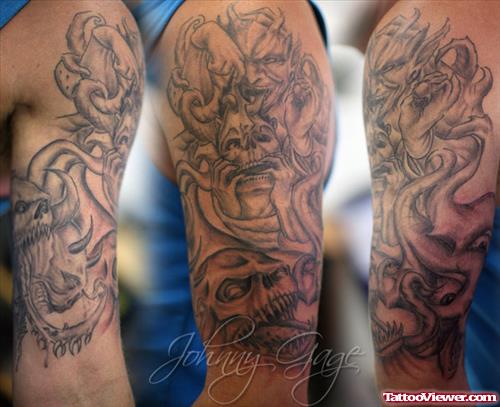 Grey Ink Skull And Demon Sleeve Tattoo