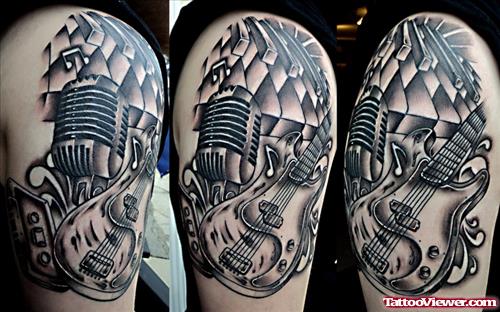 Grey Ink Mic And Guitar Half Sleeve Tattoo