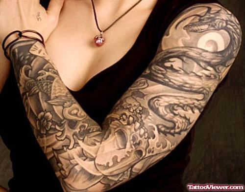 Beautiful Grey Ink Dragon Left Sleeve Tattoo