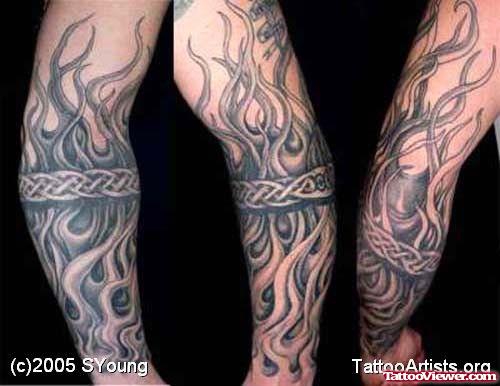 Tribal Flames And Celtic Sleeve Tattoo