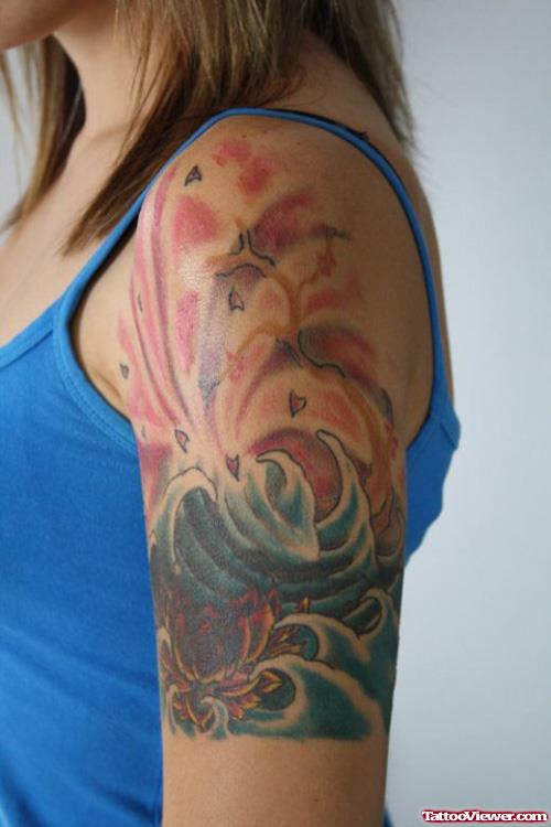 Lotus Flowers And Waves Sleeve Tattoo For Girls