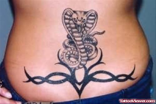 Tribal Design And Snake Tattoo On Lower Back