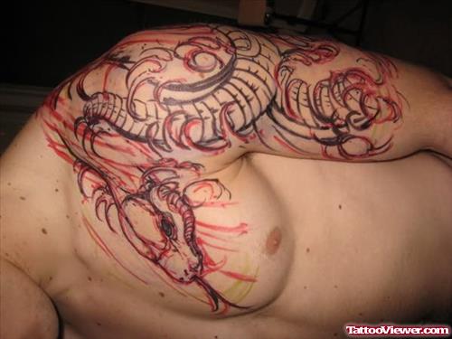Chest And Shoulder Snake Tattoo