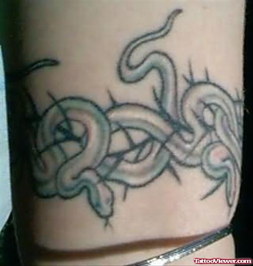 Long Snake Tattoo On Wrist