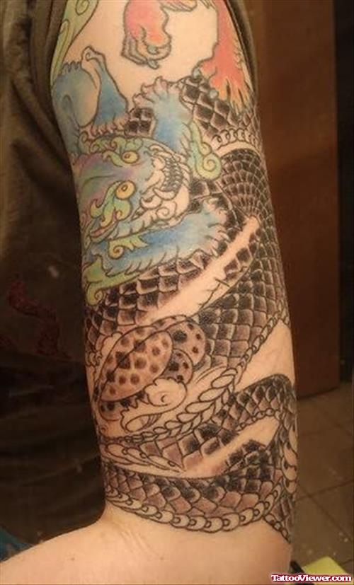 Snake Tattoo On Biceps