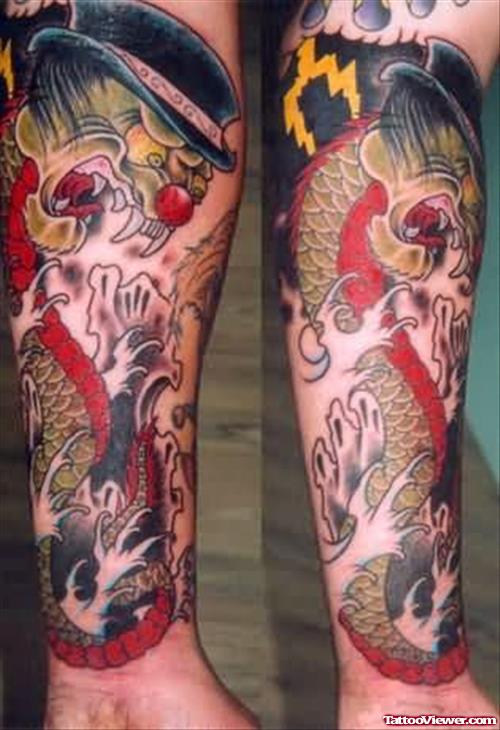 Snake Fighting Tattoo On Arm