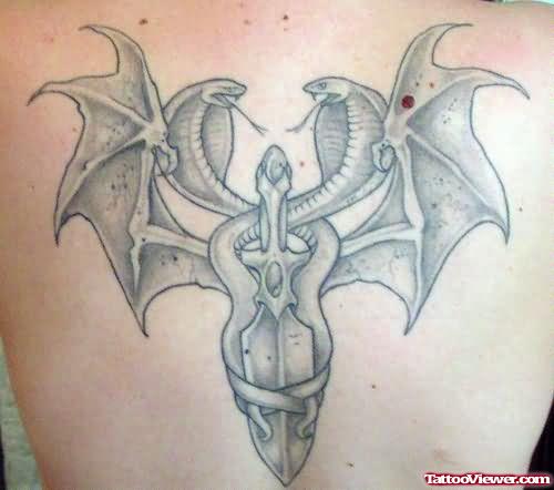 Snake and Bat Wings Tattoo