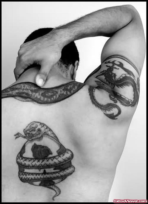 Draft Lens Snake Tattoo On Back