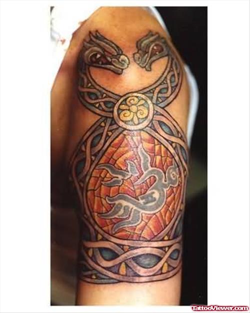 Tribal Snakes Tattoos Designs