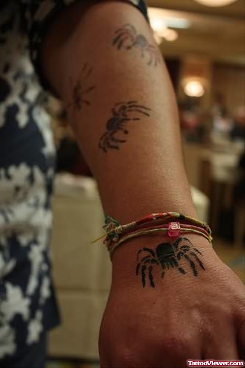 Spiders Tattoos On Arms