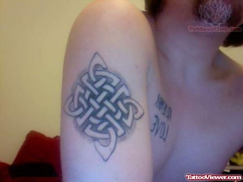 Spiritual Celtic Tattoo On Biceps