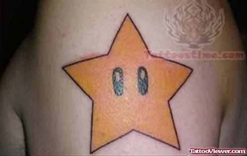 Yellow Star Tattoo On Shoulder