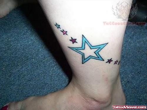 Colorful Star Tattoo On Leg