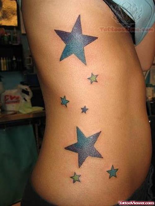 Stars Tattoos On Side Rib