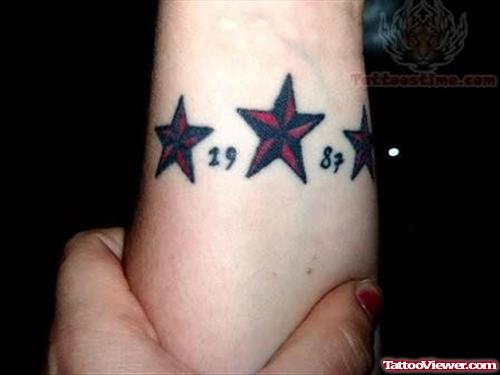 Colored Star Tattoo On Arm