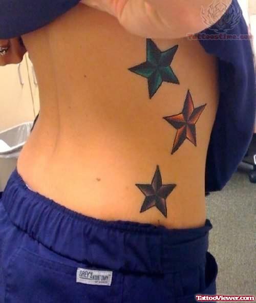 Colorful Stars Tattoo on Side Rib