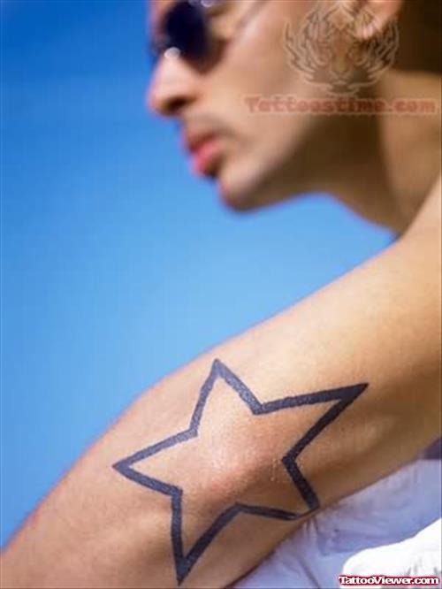 Big Star Tattoo On Elbow