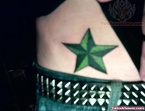 Green Star Tattoo On Waist