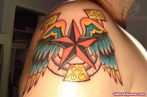 Winged Star Tattoo On Shoulder