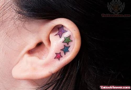 Colorful Stars Tattoos In Ear