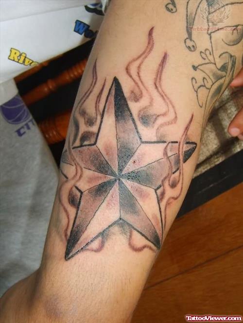 Flaming Nautical Star Tattoo